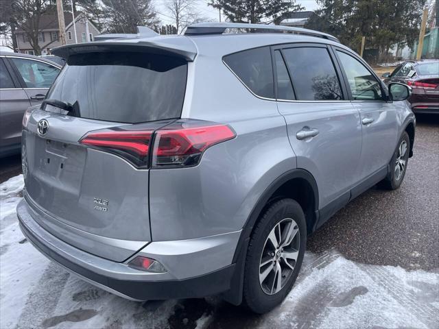 used 2018 Toyota RAV4 car, priced at $19,300