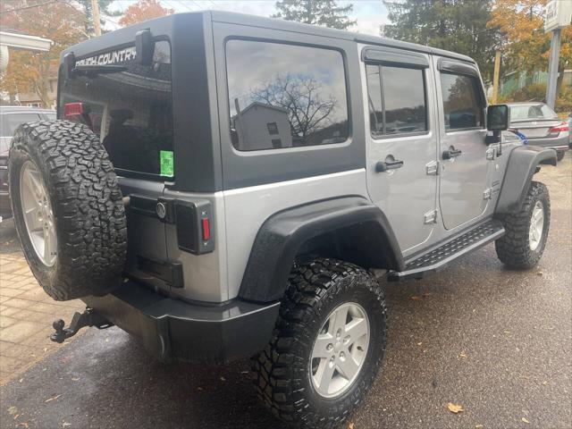 used 2018 Jeep Wrangler JK Unlimited car, priced at $22,400