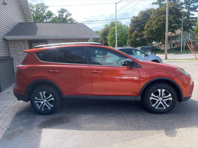 used 2016 Toyota RAV4 car, priced at $13,900