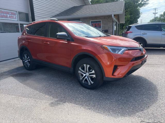 used 2016 Toyota RAV4 car, priced at $13,900