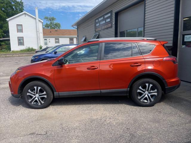 used 2016 Toyota RAV4 car, priced at $13,900