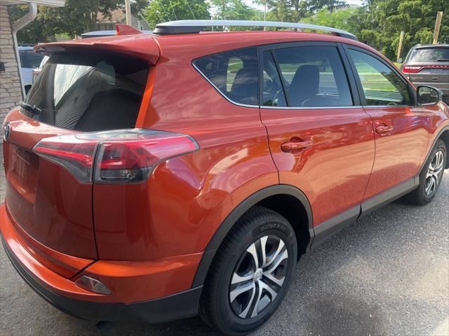 used 2016 Toyota RAV4 car, priced at $13,900