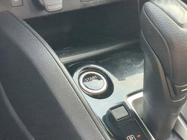 used 2023 Nissan Versa car, priced at $15,000