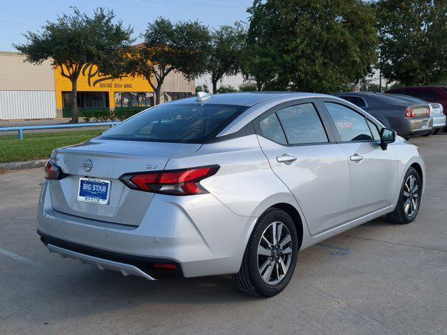 used 2023 Nissan Versa car, priced at $15,000