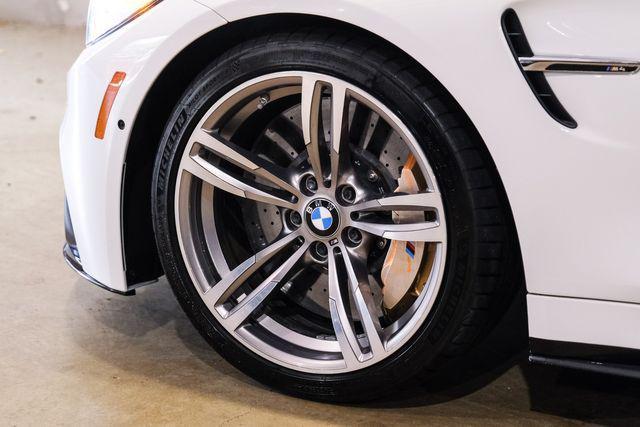 used 2015 BMW M4 car, priced at $39,900