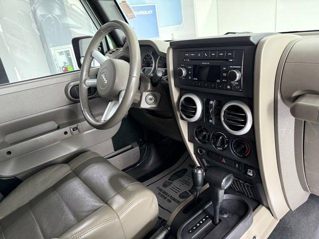 used 2010 Jeep Wrangler Unlimited car, priced at $13,995