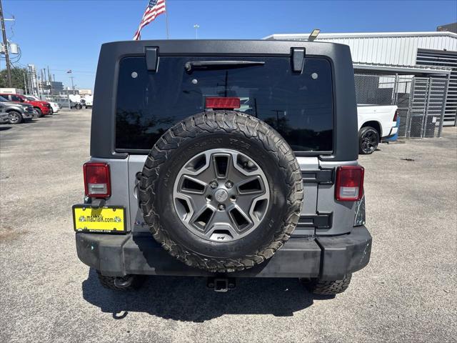 used 2014 Jeep Wrangler Unlimited car, priced at $17,500