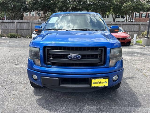 used 2014 Ford F-150 car, priced at $18,000