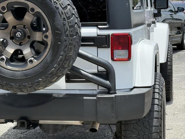used 2016 Jeep Wrangler Unlimited car, priced at $17,500