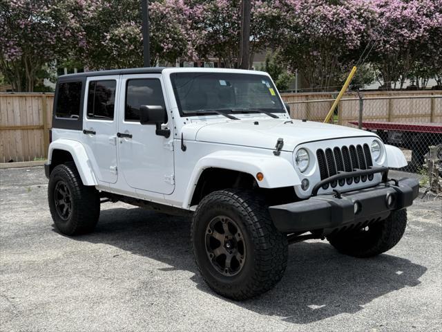 used 2016 Jeep Wrangler Unlimited car, priced at $17,500
