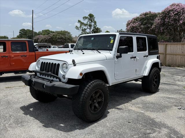 used 2016 Jeep Wrangler Unlimited car, priced at $17,500