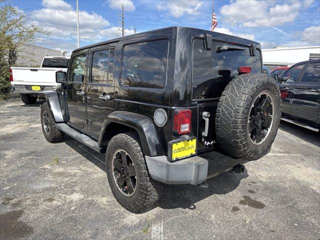 used 2012 Jeep Wrangler Unlimited car, priced at $13,500