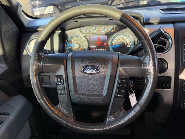 used 2014 Ford F-150 car, priced at $16,000