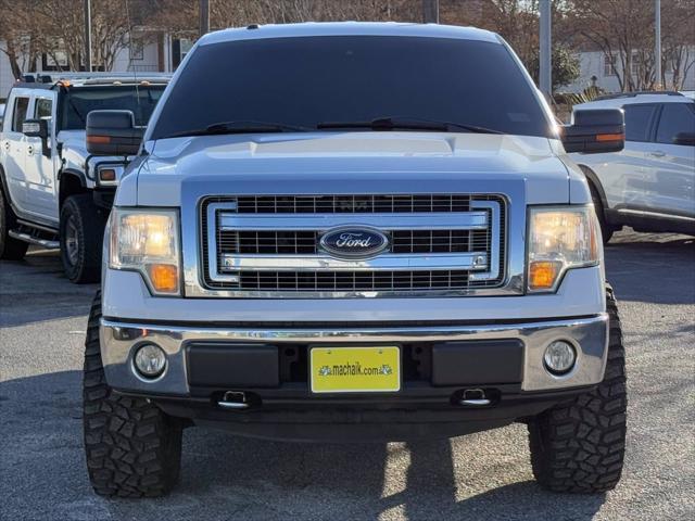 used 2014 Ford F-150 car, priced at $16,000