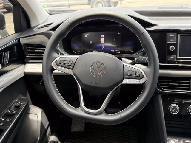 used 2023 Volkswagen Taos car, priced at $23,000