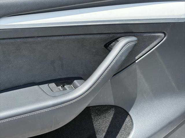 used 2023 Tesla Model Y car, priced at $27,500