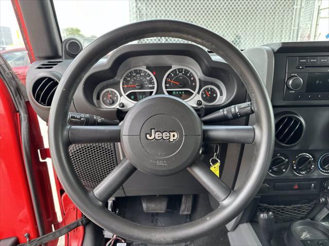 used 2010 Jeep Wrangler Unlimited car, priced at $12,000