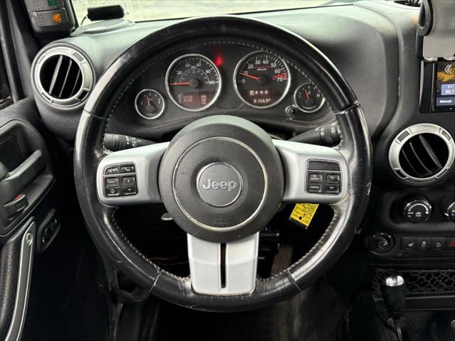 used 2016 Jeep Wrangler Unlimited car, priced at $21,500