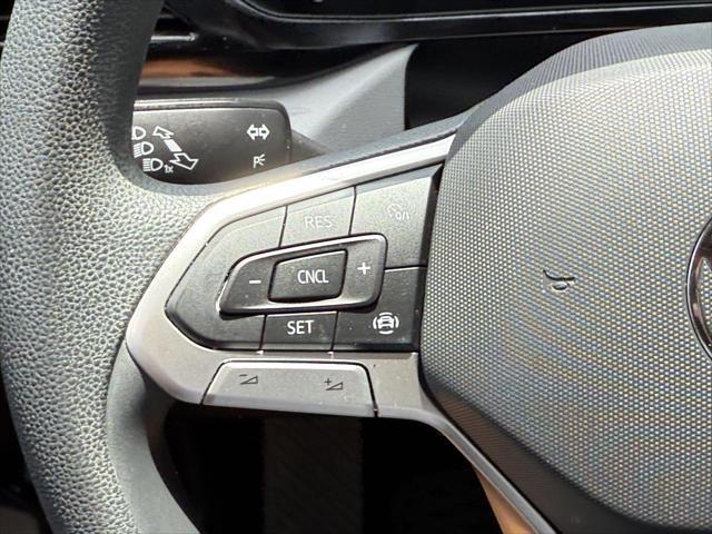 used 2022 Volkswagen Taos car, priced at $20,000