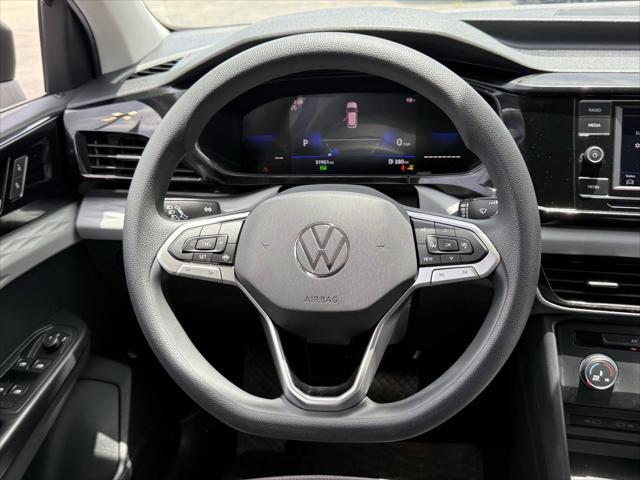 used 2022 Volkswagen Taos car, priced at $20,000