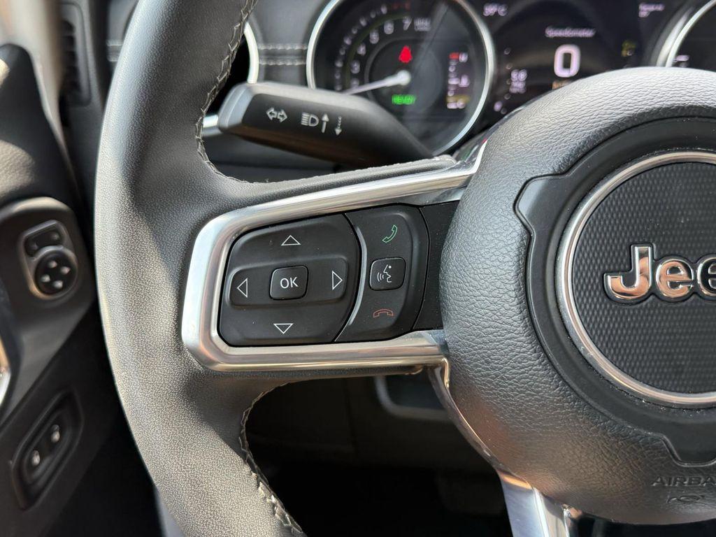 used 2023 Jeep Wrangler 4xe car, priced at $31,000