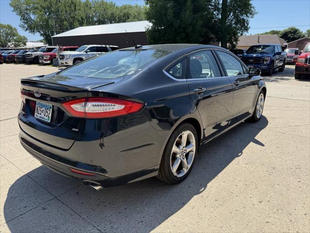 used 2014 Ford Fusion car, priced at $10,499