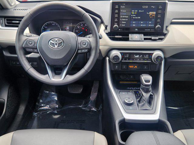 used 2021 Toyota RAV4 Hybrid car, priced at $27,995