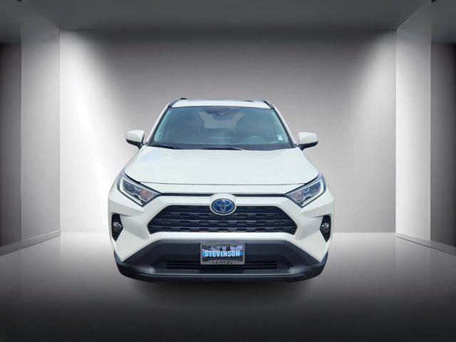 used 2021 Toyota RAV4 Hybrid car, priced at $27,995
