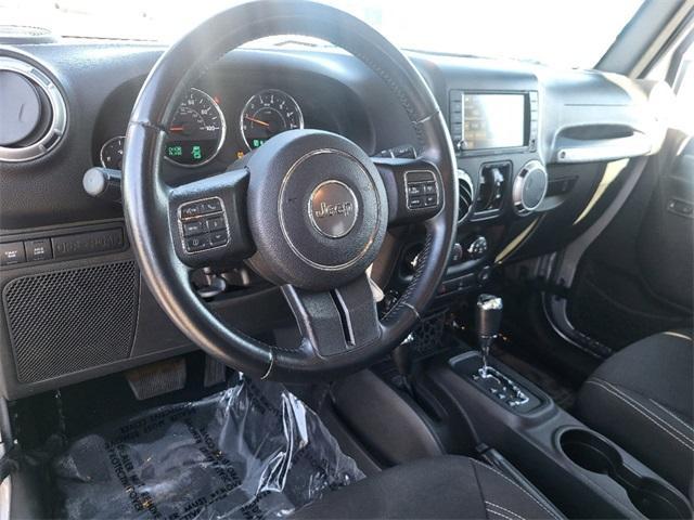 used 2015 Jeep Wrangler Unlimited car, priced at $22,249