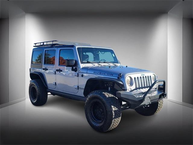 used 2015 Jeep Wrangler Unlimited car, priced at $22,249