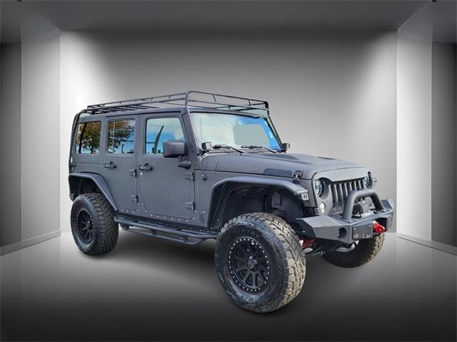 used 2016 Jeep Wrangler Unlimited car, priced at $29,298