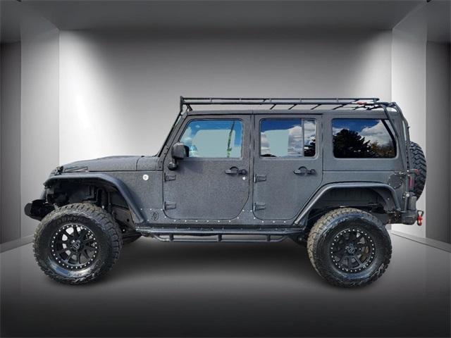 used 2016 Jeep Wrangler Unlimited car, priced at $29,298