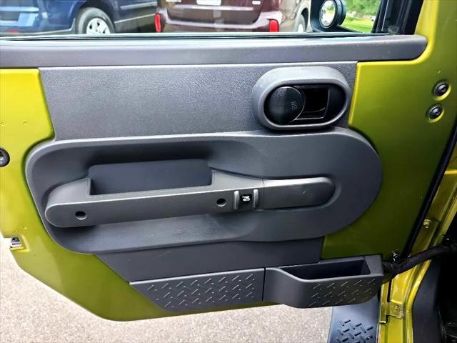 used 2010 Jeep Wrangler Unlimited car, priced at $10,990