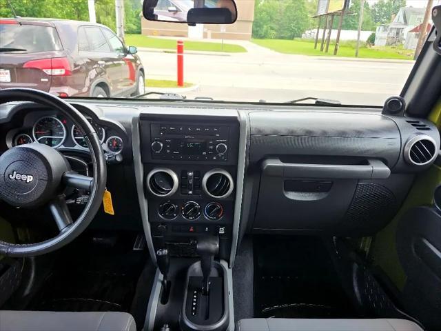used 2010 Jeep Wrangler Unlimited car, priced at $10,990