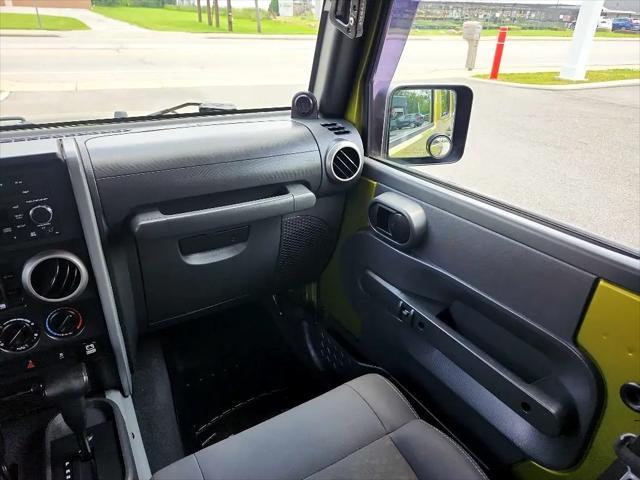 used 2010 Jeep Wrangler Unlimited car, priced at $10,990
