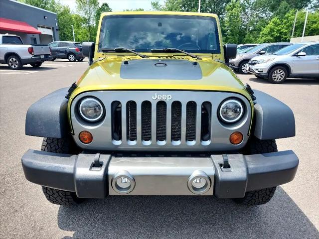 used 2010 Jeep Wrangler Unlimited car, priced at $10,990