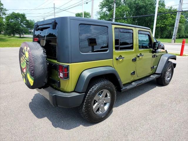used 2010 Jeep Wrangler Unlimited car, priced at $10,990
