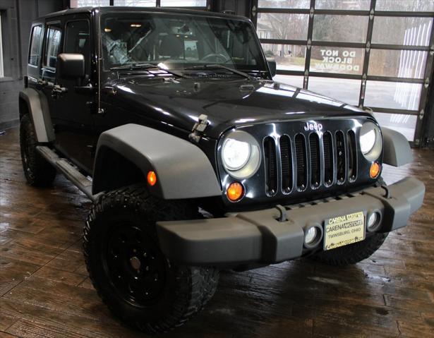 used 2013 Jeep Wrangler Unlimited car, priced at $15,999