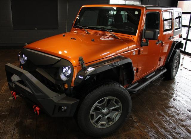 used 2011 Jeep Wrangler Unlimited car, priced at $16,999