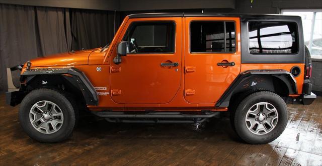used 2011 Jeep Wrangler Unlimited car, priced at $16,299