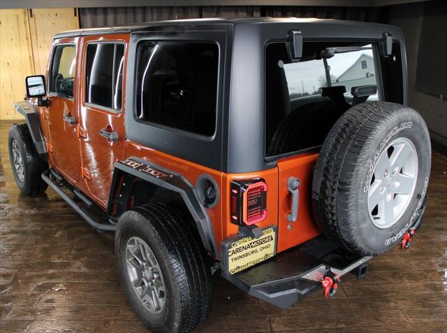 used 2011 Jeep Wrangler Unlimited car, priced at $16,999