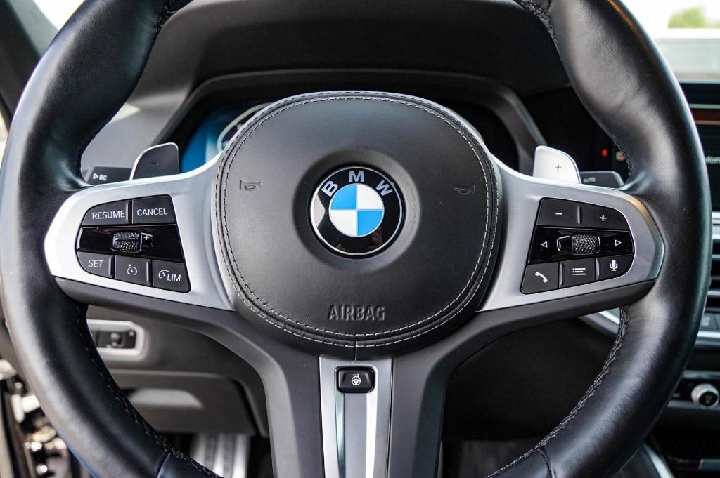 used 2023 BMW X6 car, priced at $70,822