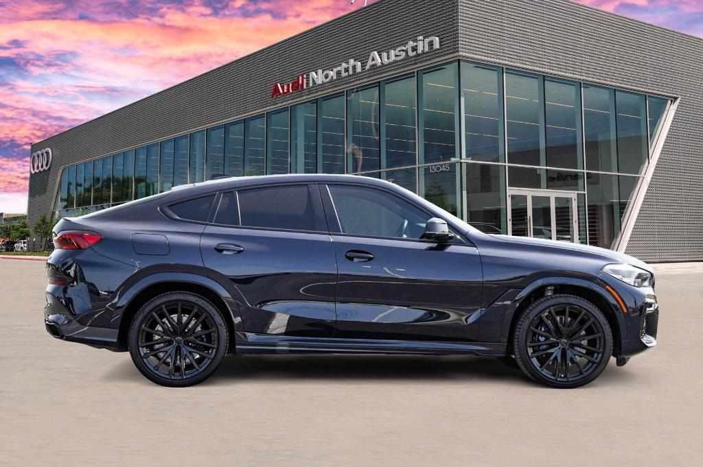 used 2023 BMW X6 car, priced at $70,822