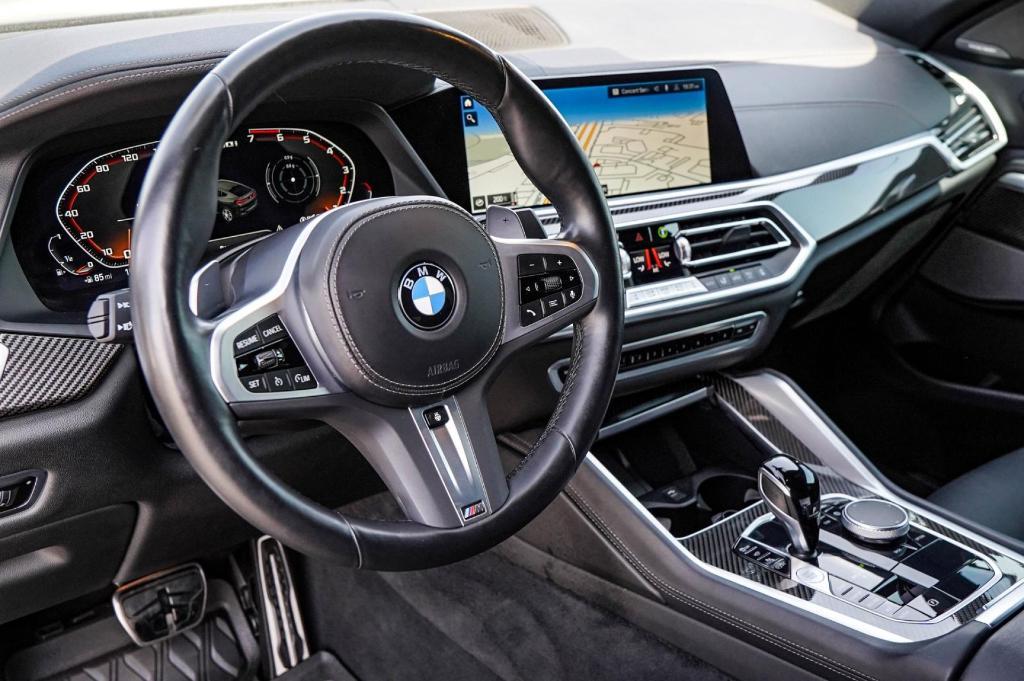 used 2023 BMW X6 car, priced at $70,822