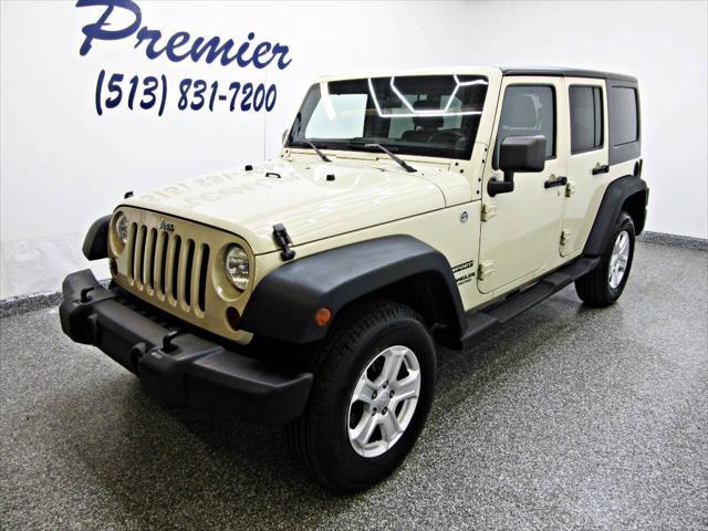 used 2011 Jeep Wrangler Unlimited car, priced at $15,995