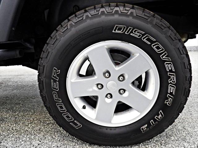 used 2011 Jeep Wrangler Unlimited car, priced at $14,995