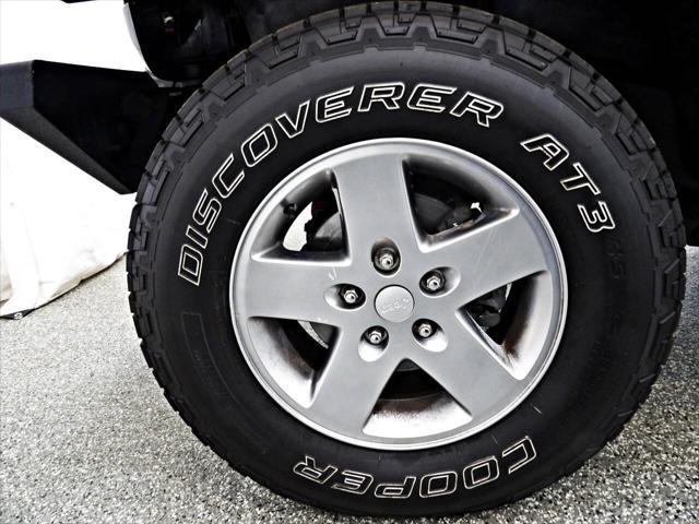 used 2011 Jeep Wrangler Unlimited car, priced at $14,995
