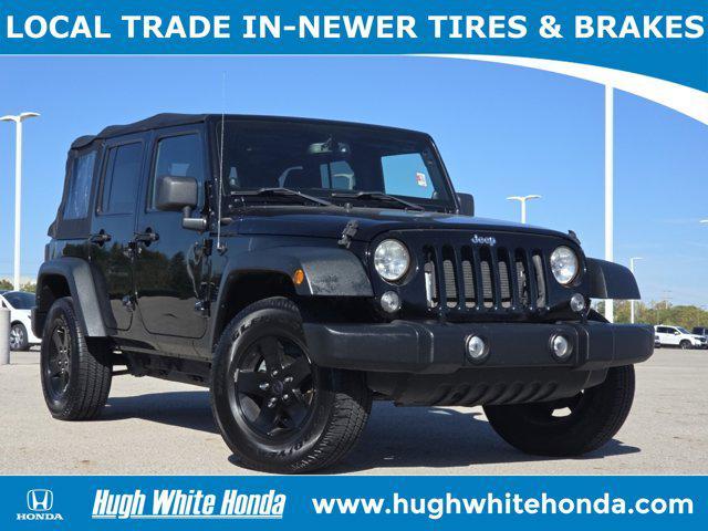 used 2014 Jeep Wrangler Unlimited car, priced at $13,339