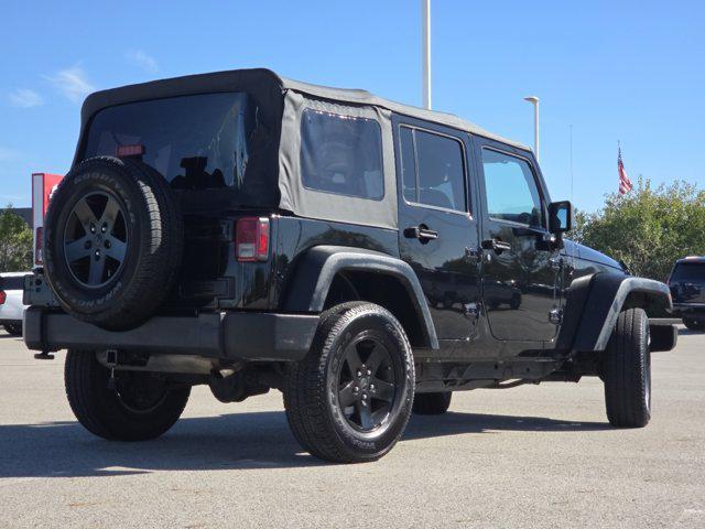 used 2014 Jeep Wrangler Unlimited car, priced at $13,933