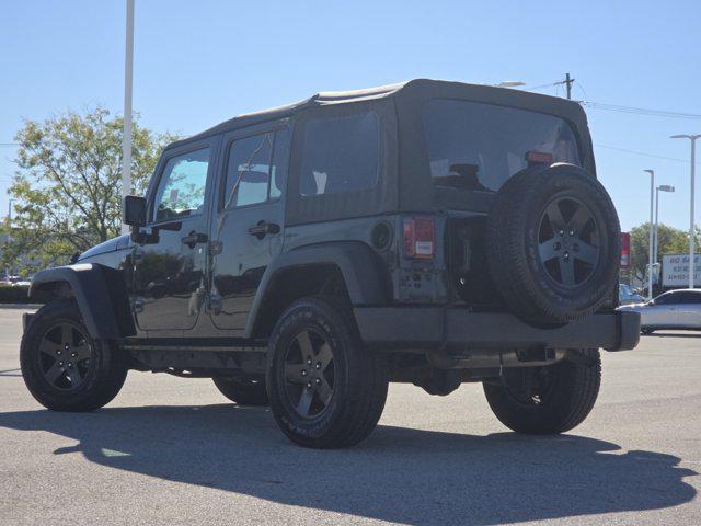 used 2014 Jeep Wrangler Unlimited car, priced at $13,933